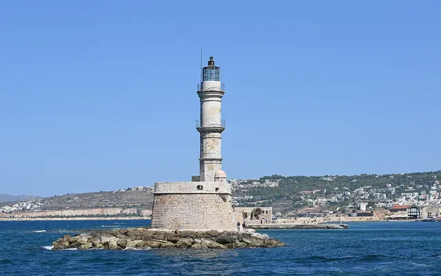 Chania old harbour lighthouse, the alternative to Heraklion Airport in western Crete