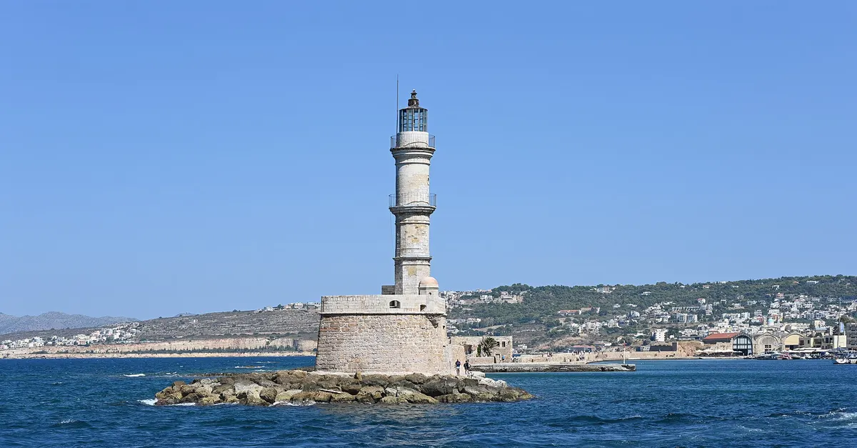Chania old harbour lighthouse, the alternative to Heraklion Airport in western Crete