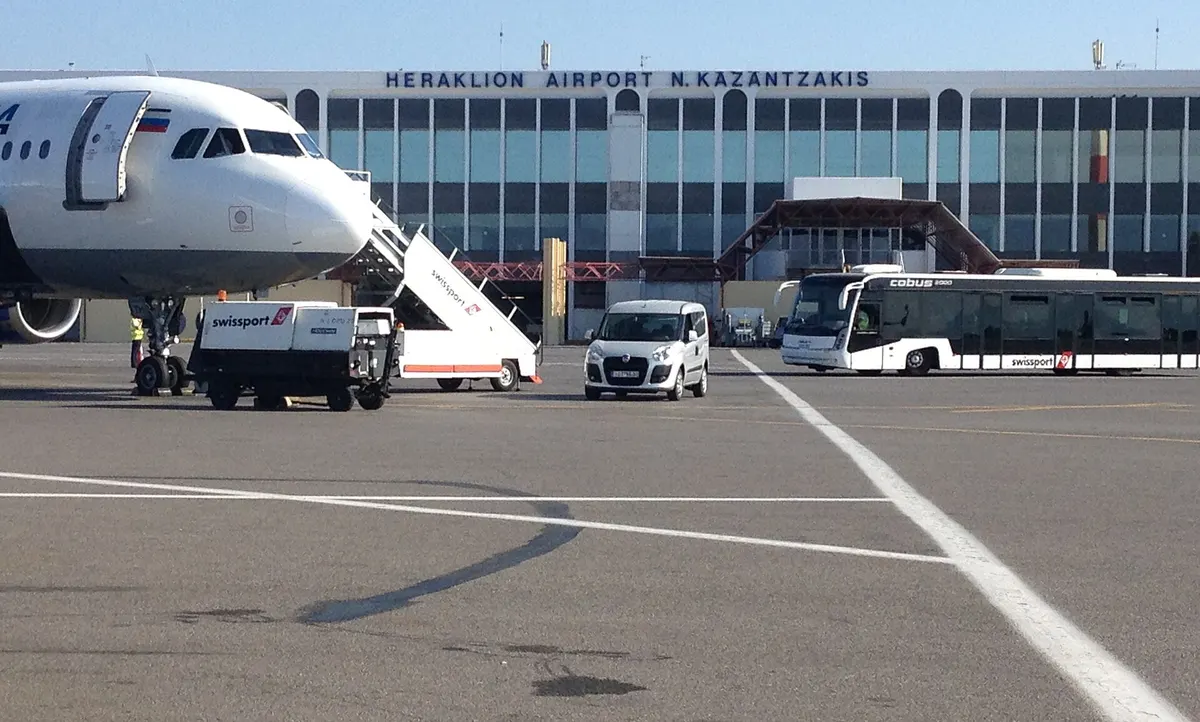 Heraklion Airport N. Kazantzakis sign seen from the apron, codes HER and LGIR