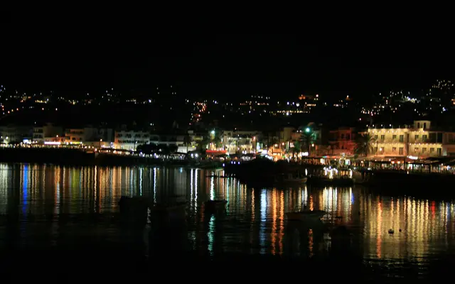 Hersonissos seafront at night, 25 km east of Heraklion Airport
