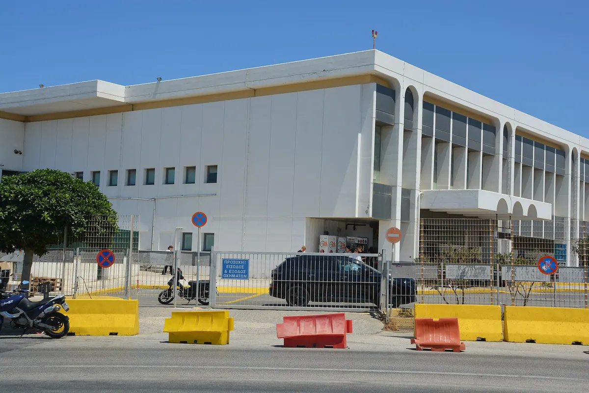 Side of the Heraklion Airport terminal building, with the sea behind