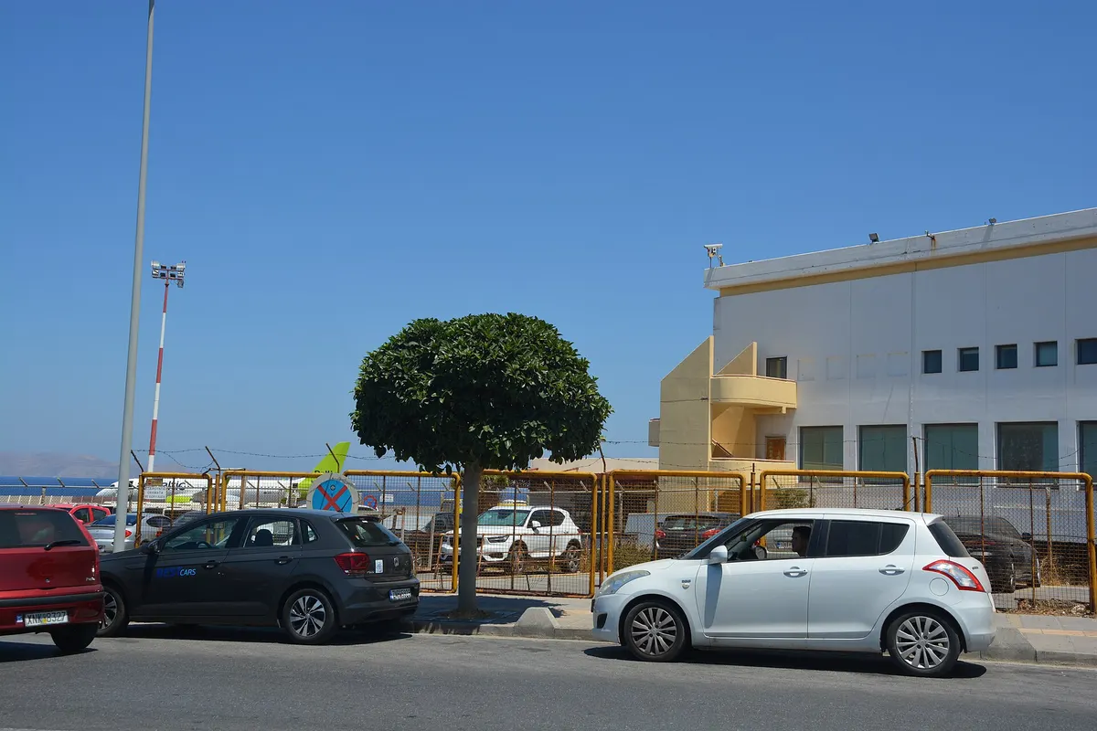Cars on the forecourt outside Heraklion Airport, near the taxi rank
